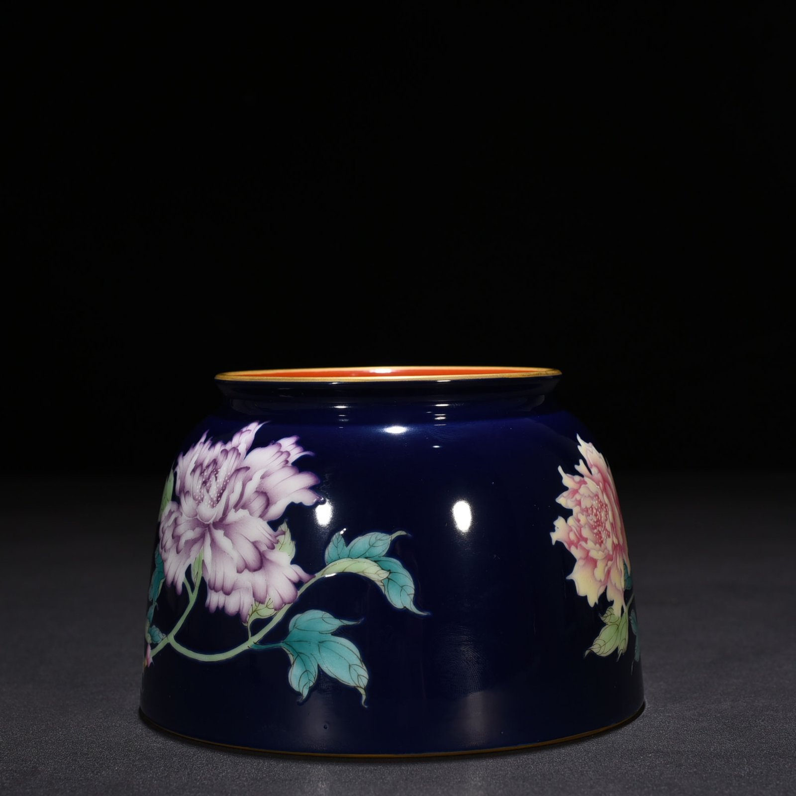 Qing Dynasty Qianlong imperial inscription blue ground enamel floral and peony pattern horseshoe statue