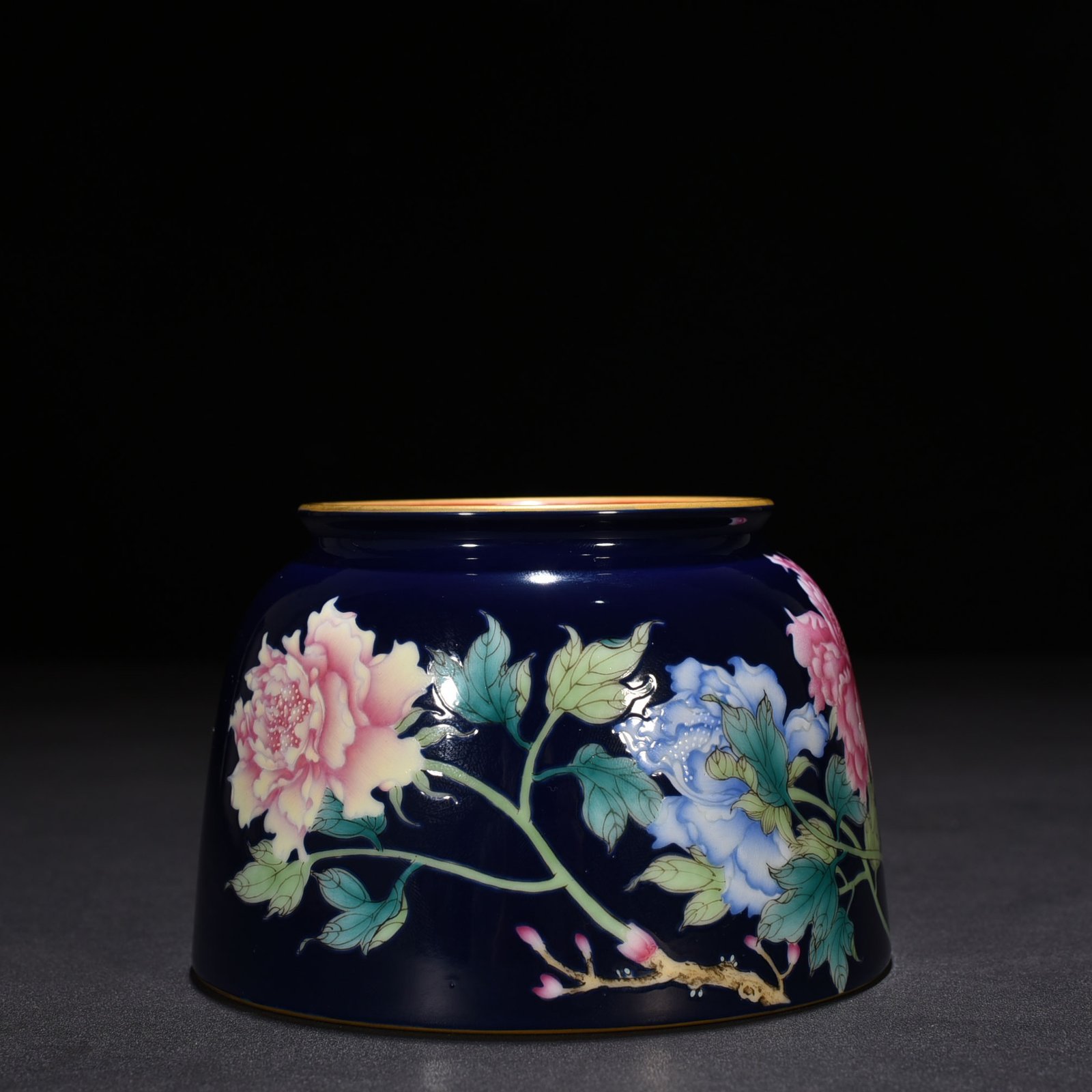 Qing Dynasty Qianlong imperial inscription blue ground enamel floral and peony pattern horseshoe statue