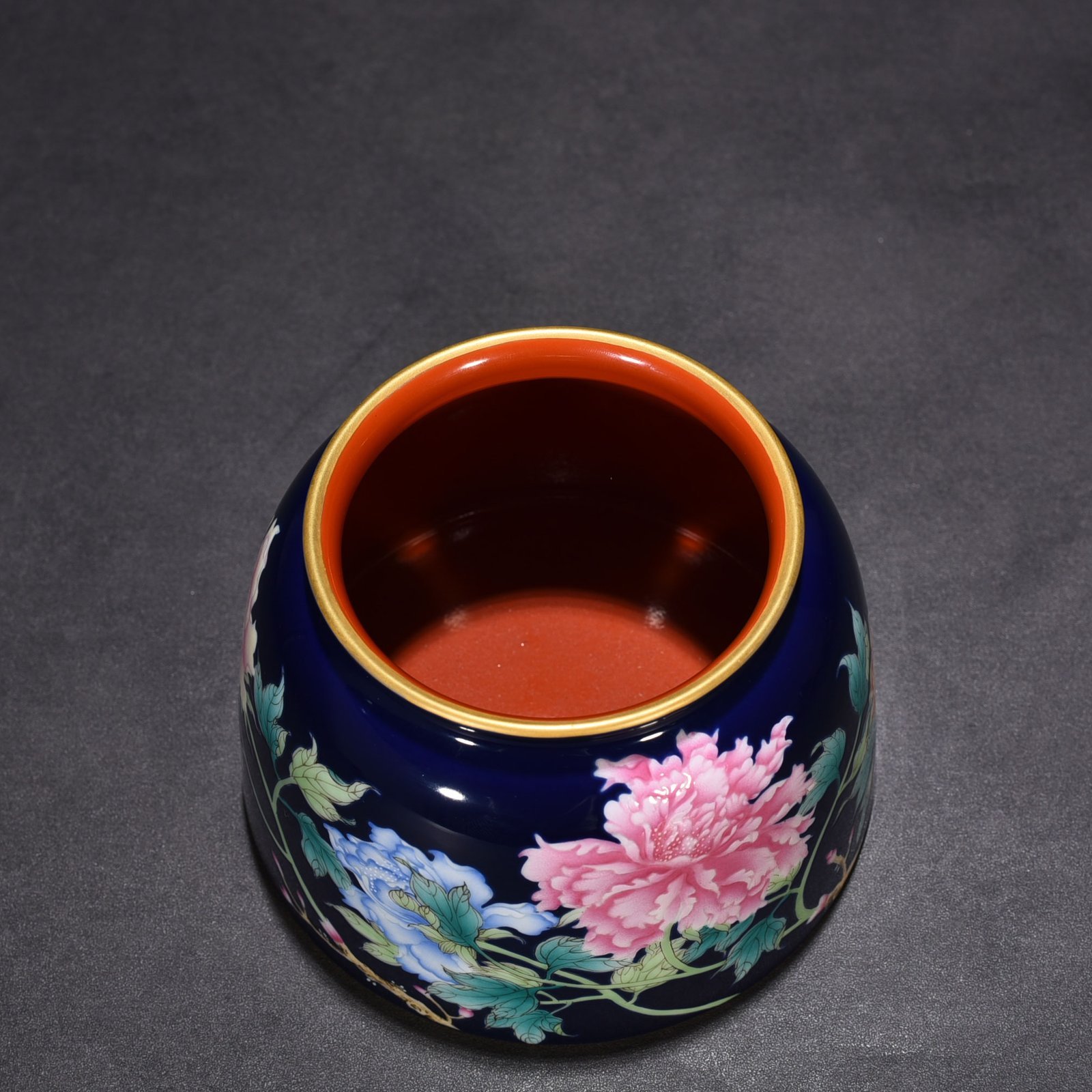 Qing Dynasty Qianlong imperial inscription blue ground enamel floral and peony pattern horseshoe statue