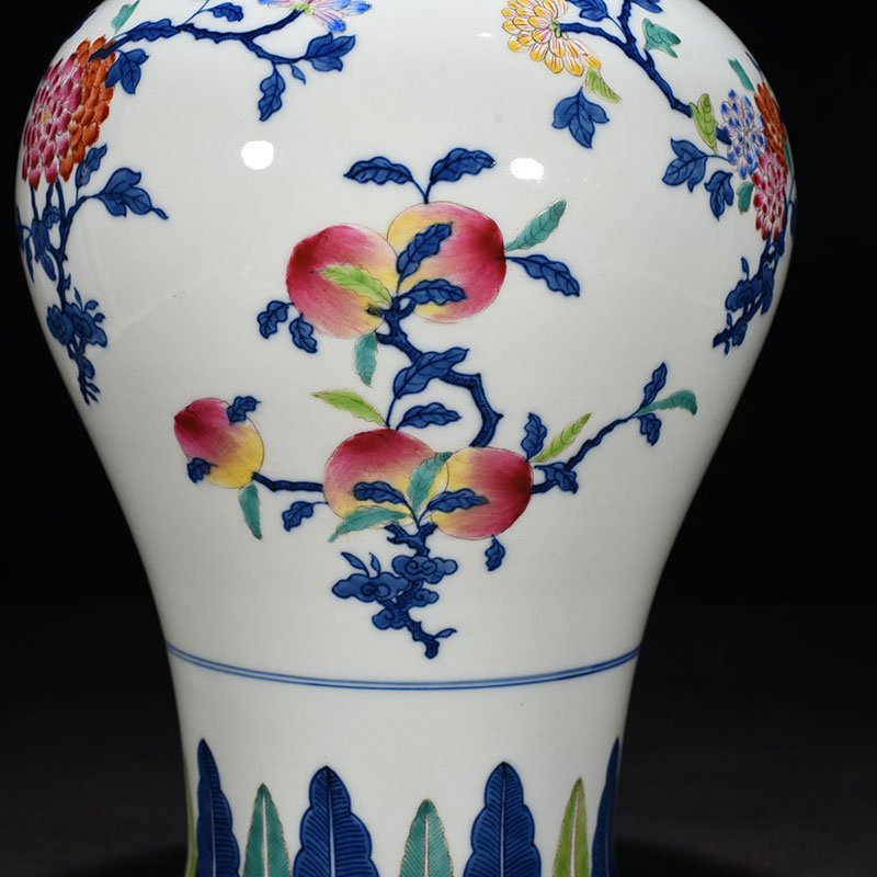 Qing Dynasty Qianlong doucai plum vase with three flowers and three fruits