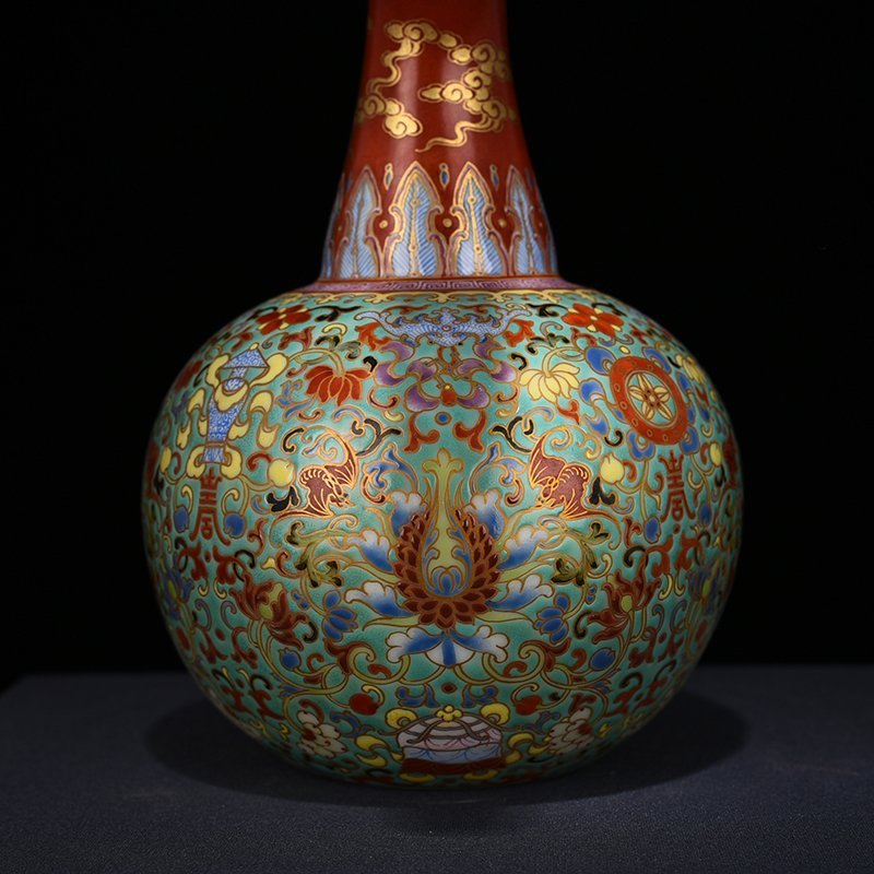 Qing Dynasty Qianlong turquoise green space pastel wrapped branches eight treasure pattern backflow pot