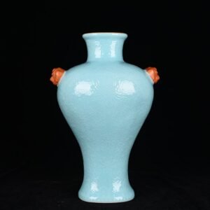 Qing Dynasty Qianlong turquoise green glaze climbing flower entangled branches and phoenix ear-shaped vase