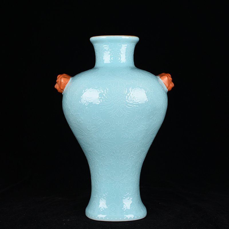 Qing Dynasty Qianlong turquoise green glaze climbing flower entangled branches and phoenix ear-shaped vase