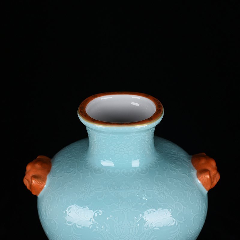 Qing Dynasty Qianlong turquoise green glaze climbing flower entangled branches and phoenix ear-shaped vase