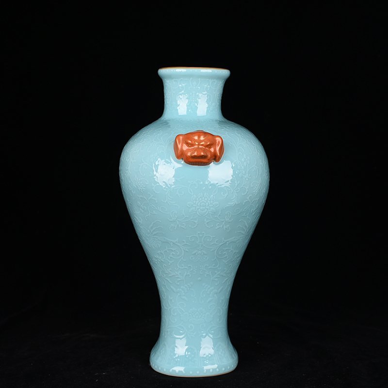 Qing Dynasty Qianlong turquoise green glaze climbing flower entangled branches and phoenix ear-shaped vase