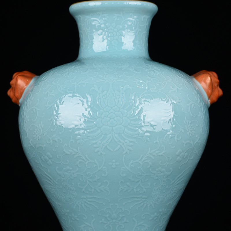 Qing Dynasty Qianlong turquoise green glaze climbing flower entangled branches and phoenix ear-shaped vase