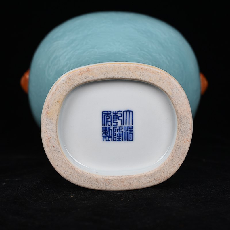 Qing Dynasty Qianlong turquoise green glaze climbing flower entangled branches and phoenix ear-shaped vase