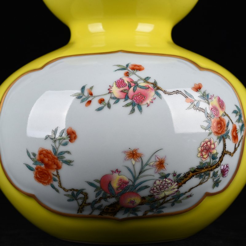 Qing Dynasty Qianlong lemon yellow glaze consecrated gourd vase