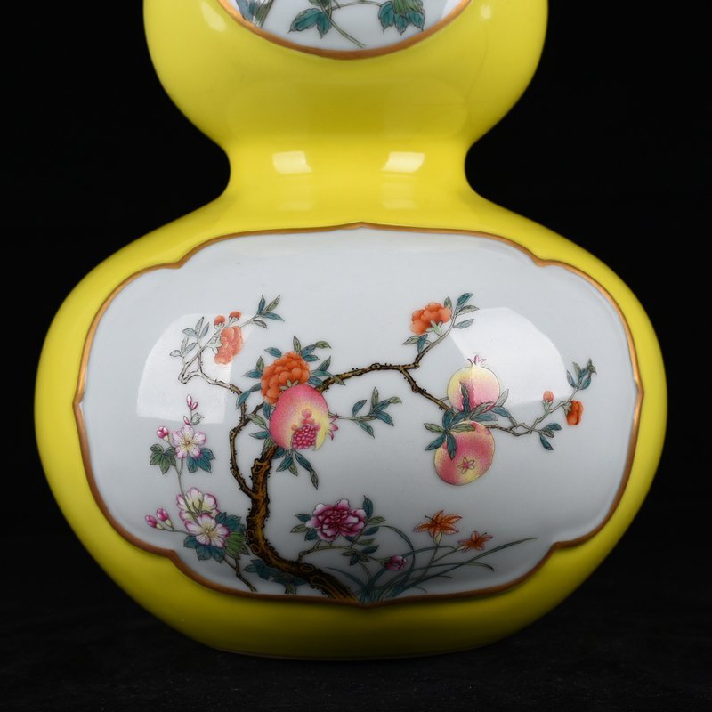 Qing Dynasty Qianlong lemon yellow glaze consecrated gourd vase