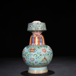 Qing Dynasty Qianlong coral green land pastel wrapped branches and eight treasures pattern Bianba vase