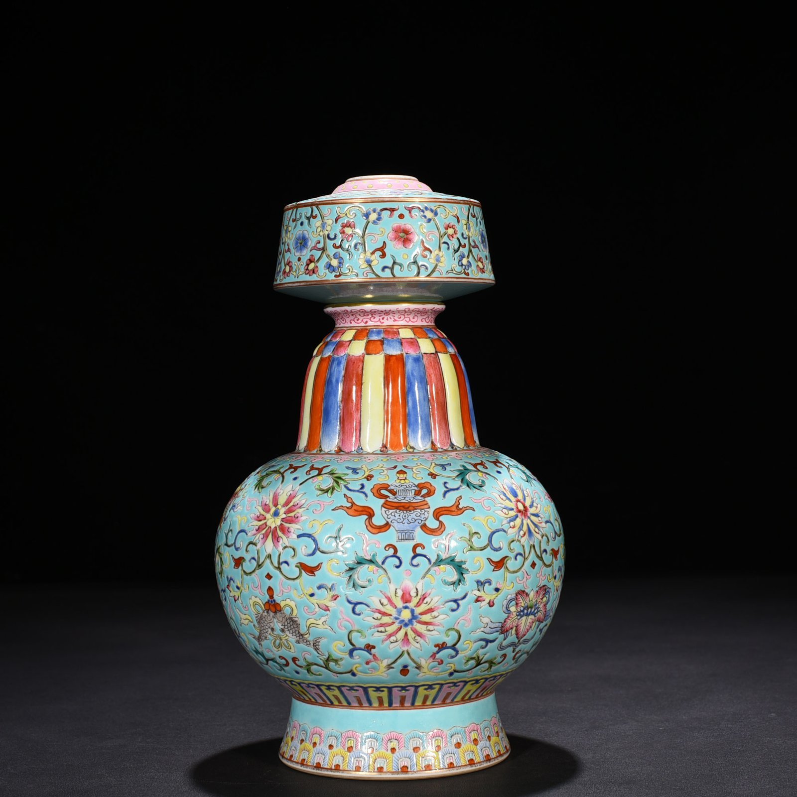 Qing Dynasty Qianlong coral green land pastel wrapped branches and eight treasures pattern Bianba vase
