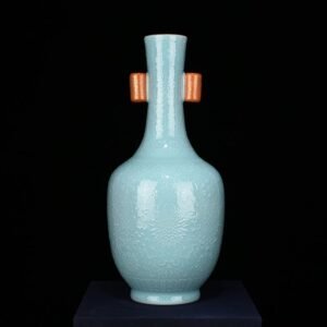 Qing Dynasty Qianlong coral green glaze with branches and flower vase