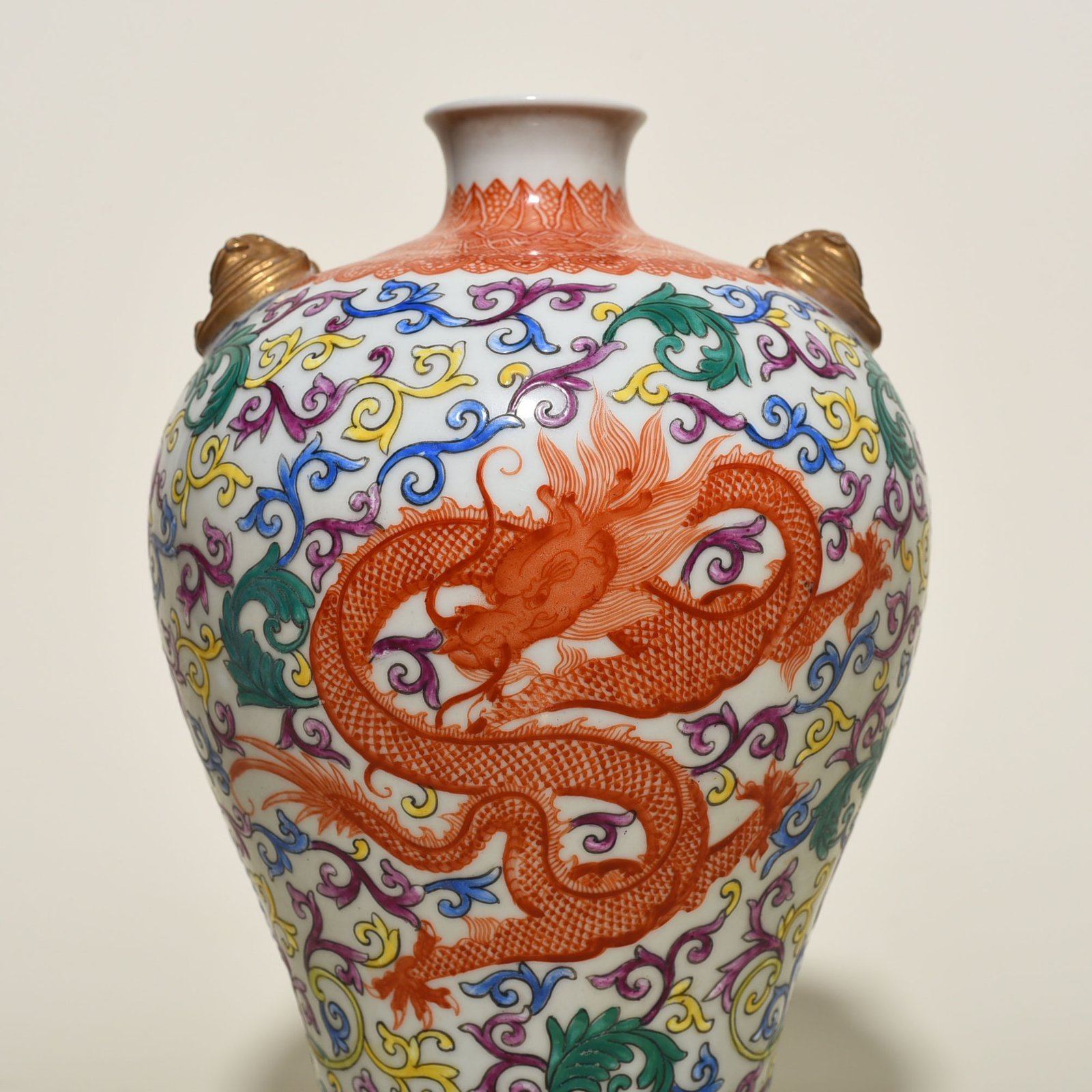 Qing Dynasty Qianlong enamel double-eared plum vase with wrapped branches and dragon pattern