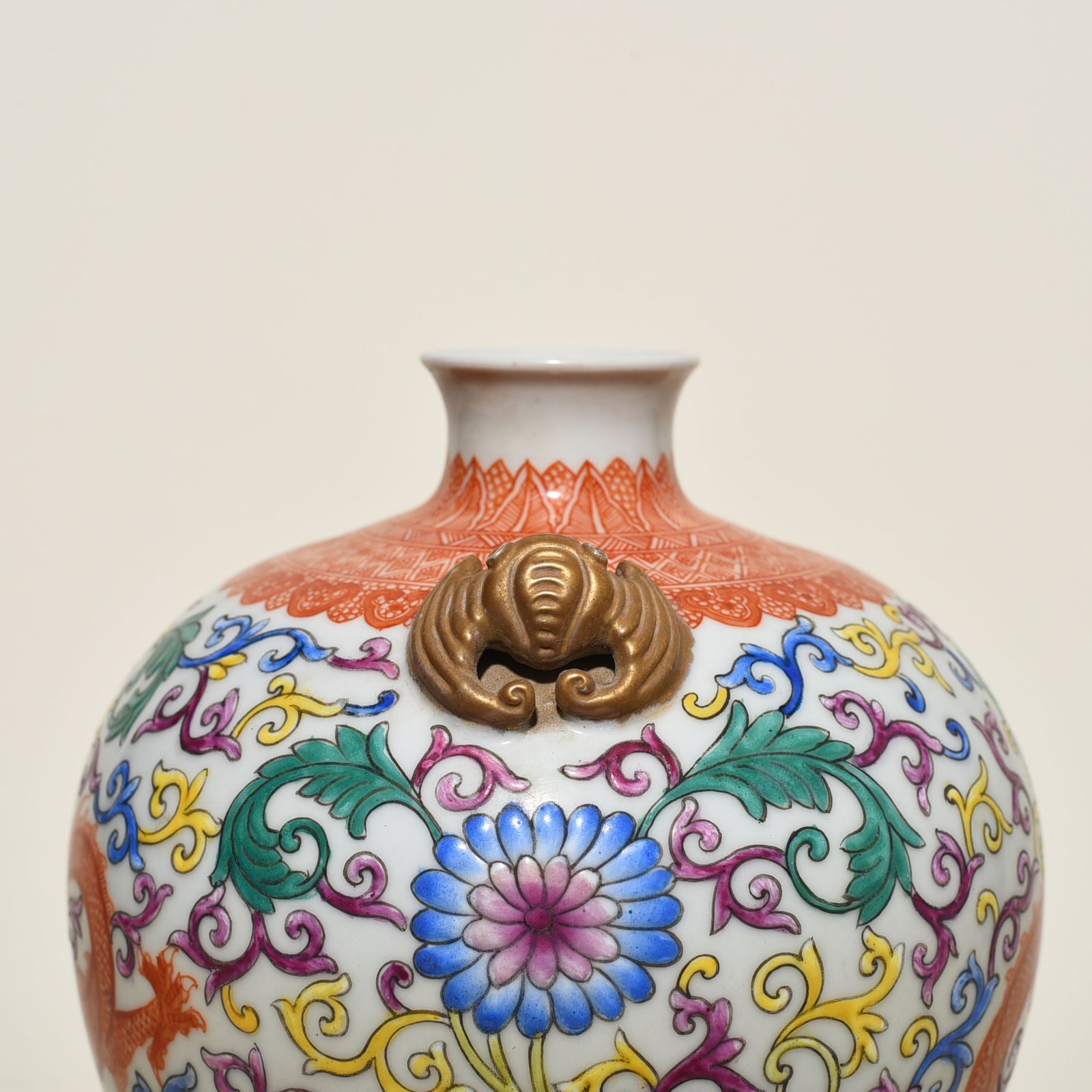 Qing Dynasty Qianlong enamel double-eared plum vase with wrapped branches and dragon pattern