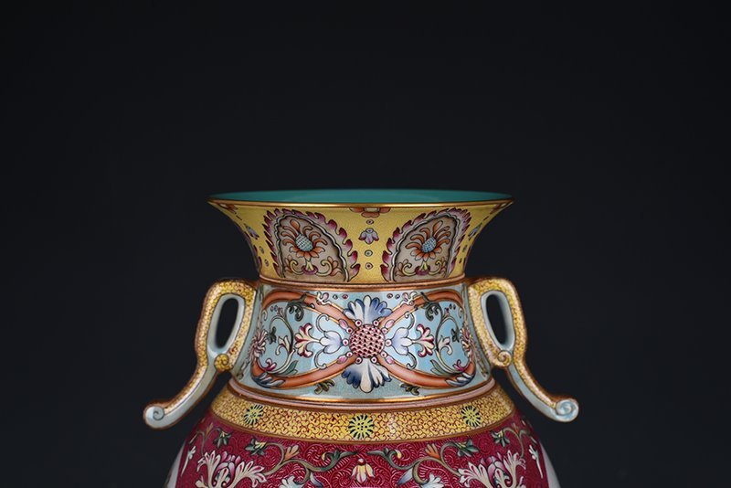 Qing Dynasty Qianlong enamel rouge red rolling pattern consecrated four-season flower and bird neck bottle