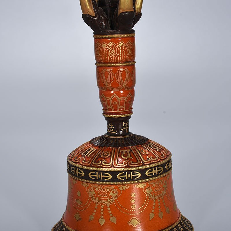 Qing Dynasty Qianlong alum red ground Sanskrit rattles carved with gold on