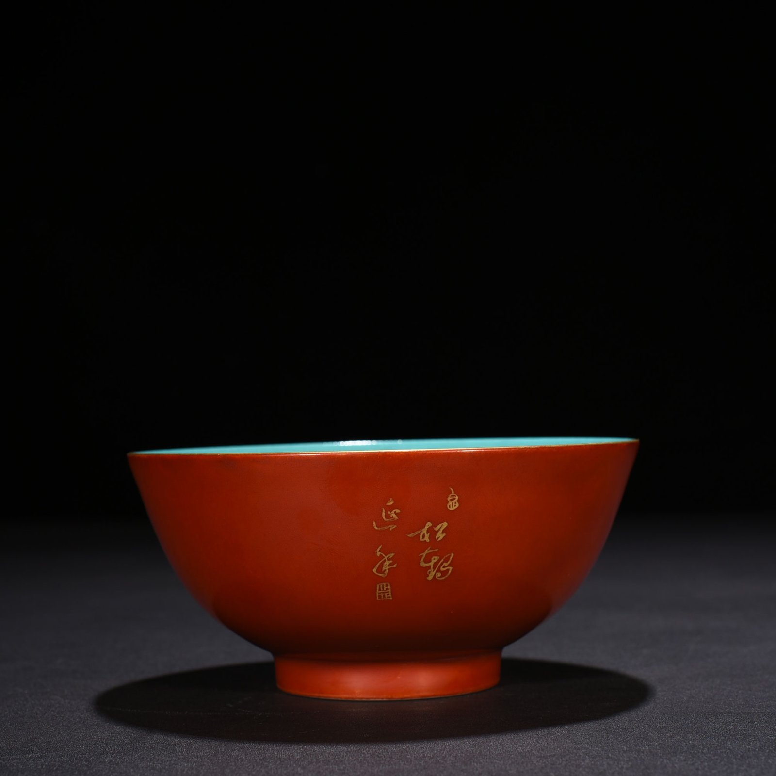 Qing Dynasty Qianlong alum red ground pastel pine and crane longevity pattern bowl