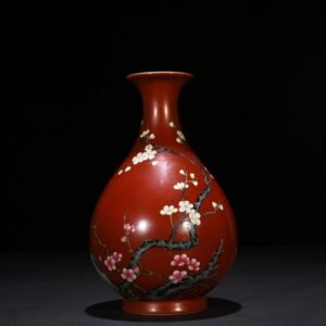 Qing Dynasty Qianlong alum red ground pastel plum pattern jade pot spring vase