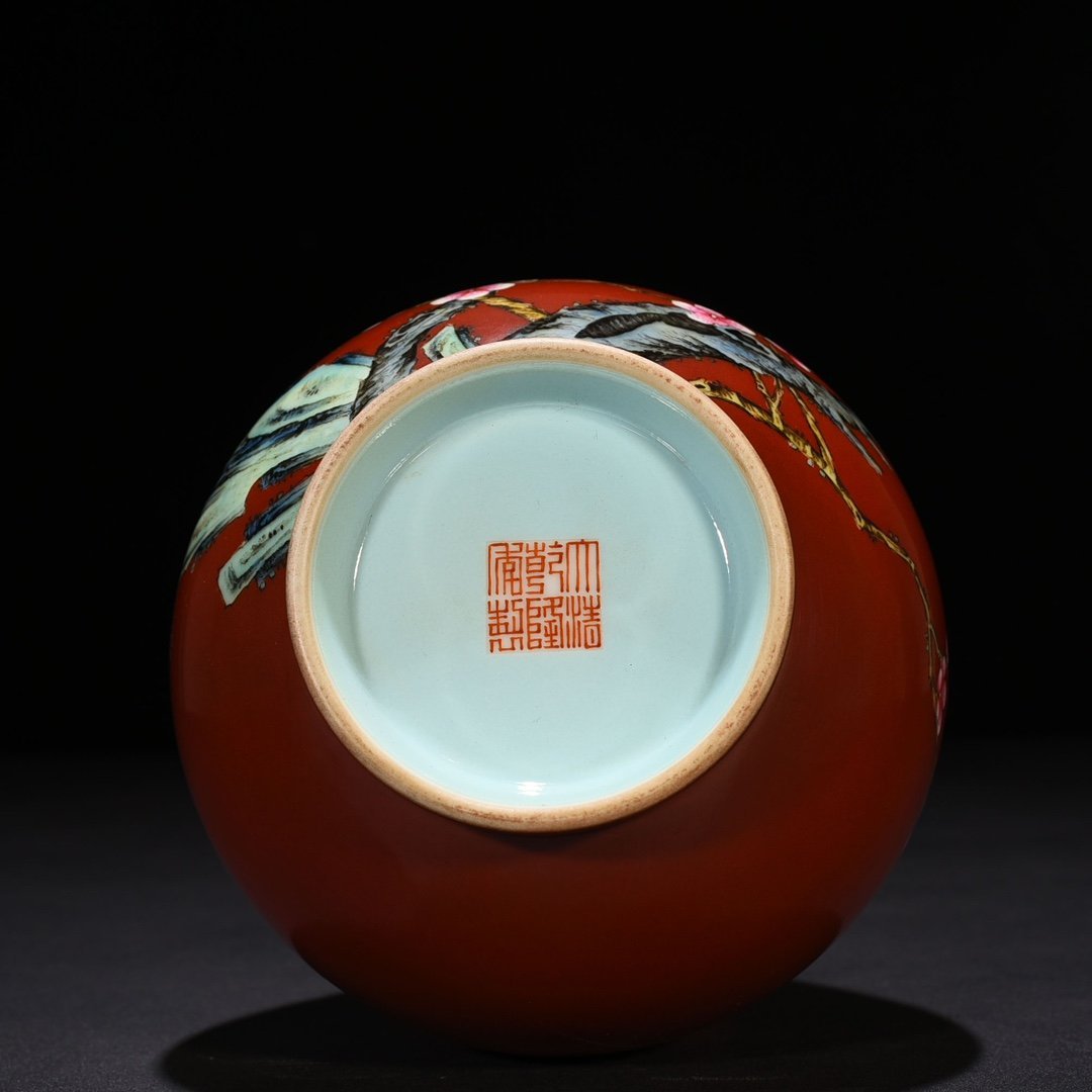 Qing Dynasty Qianlong alum red ground pastel plum pattern jade pot spring vase