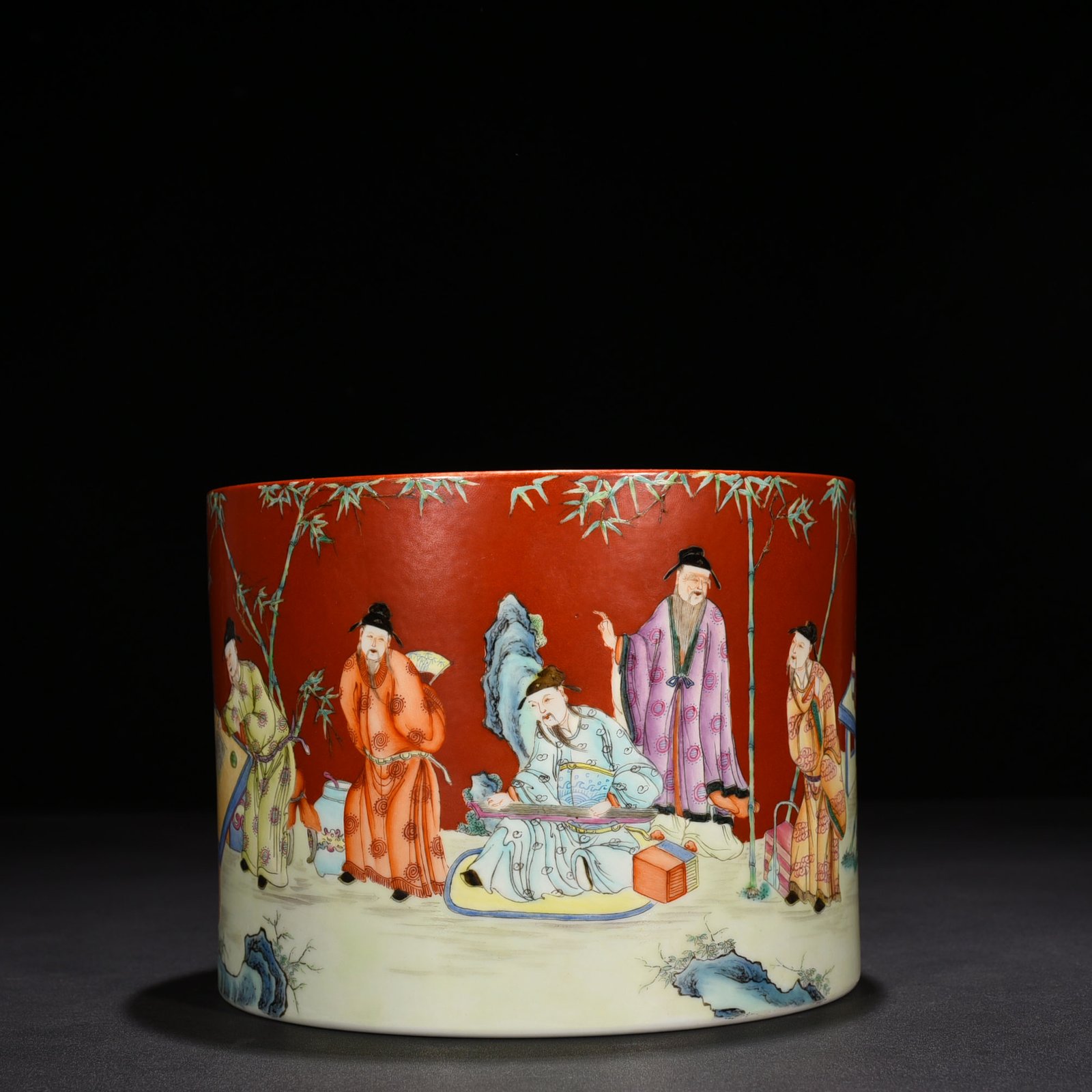 Qing Dynasty Qianlong alum red ground pastel bamboo forest figure pattern pen holder