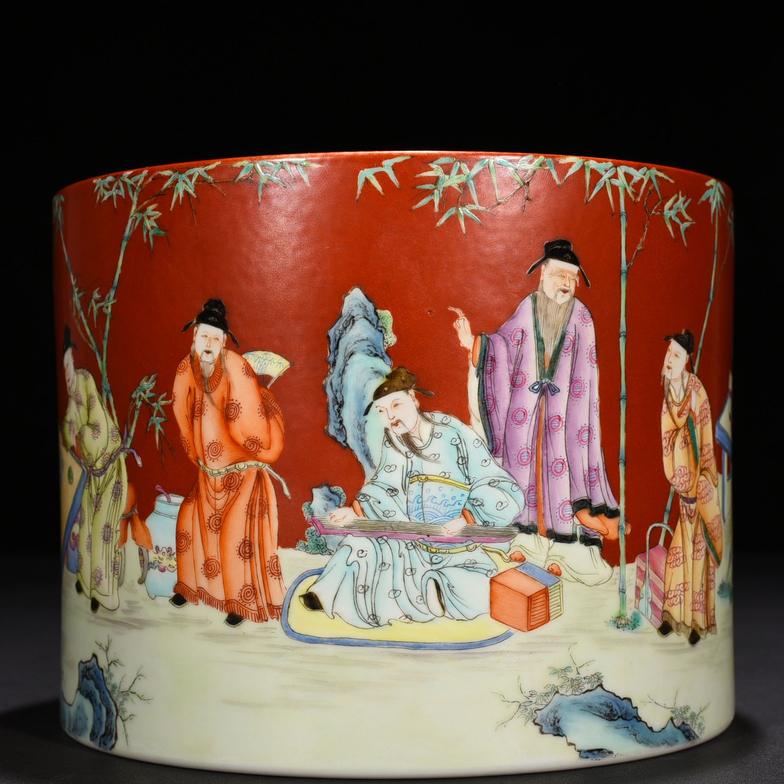 Qing Dynasty Qianlong alum red ground pastel bamboo forest figure pattern pen holder