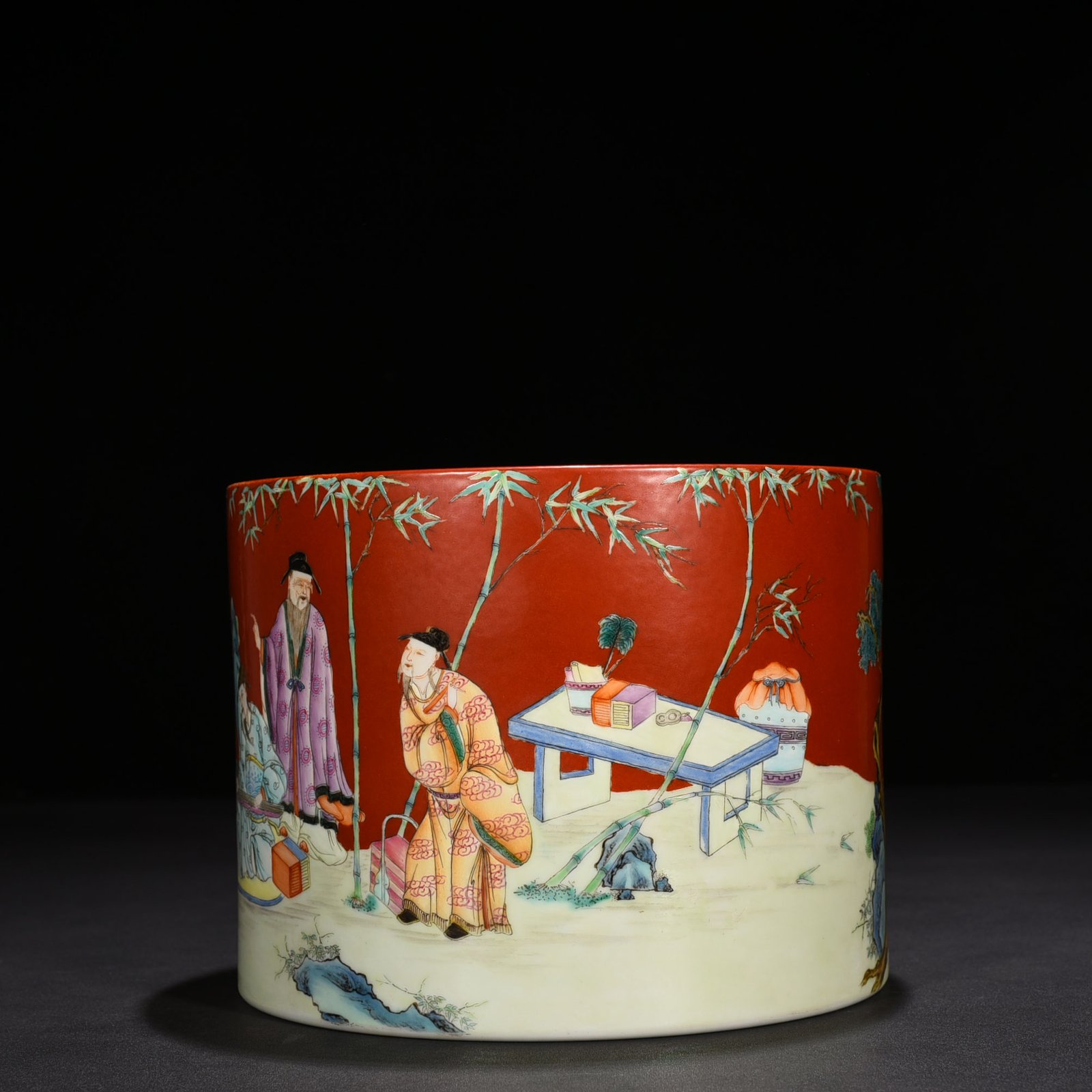 Qing Dynasty Qianlong alum red ground pastel bamboo forest figure pattern pen holder