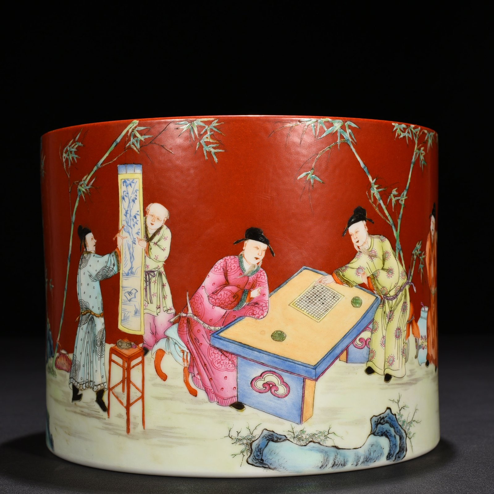 Qing Dynasty Qianlong alum red ground pastel bamboo forest figure pattern pen holder