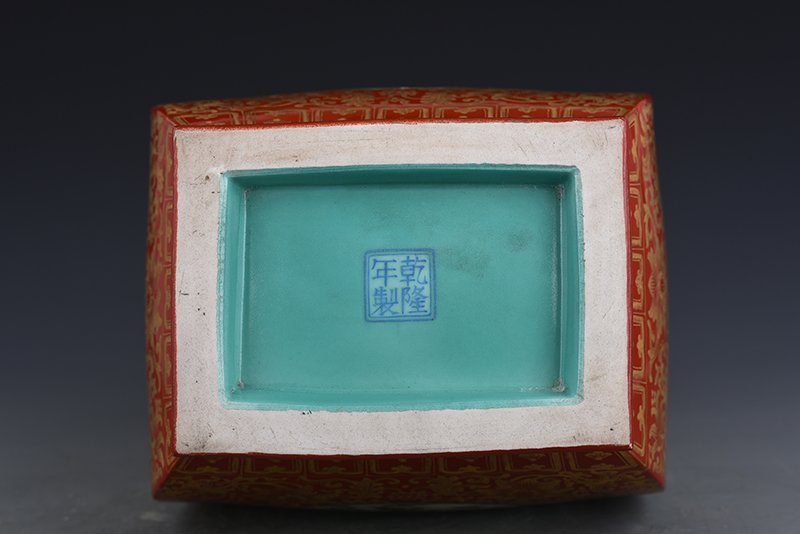 Qing Dynasty Qianlong alum red gold-consecrated enamel flower-and-bird square vase with ears