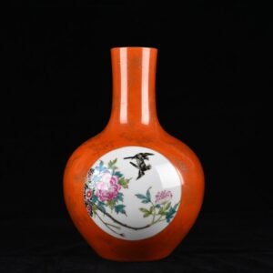 Qing Dynasty Qianlong alum red gold-consecrated flower and bird celestial sphere vase
