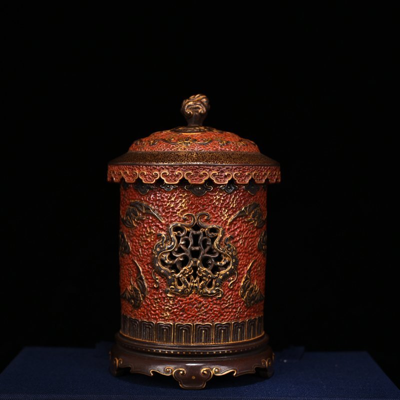 Qing Dynasty Qianlong alum red gold carved hollow smoker vase