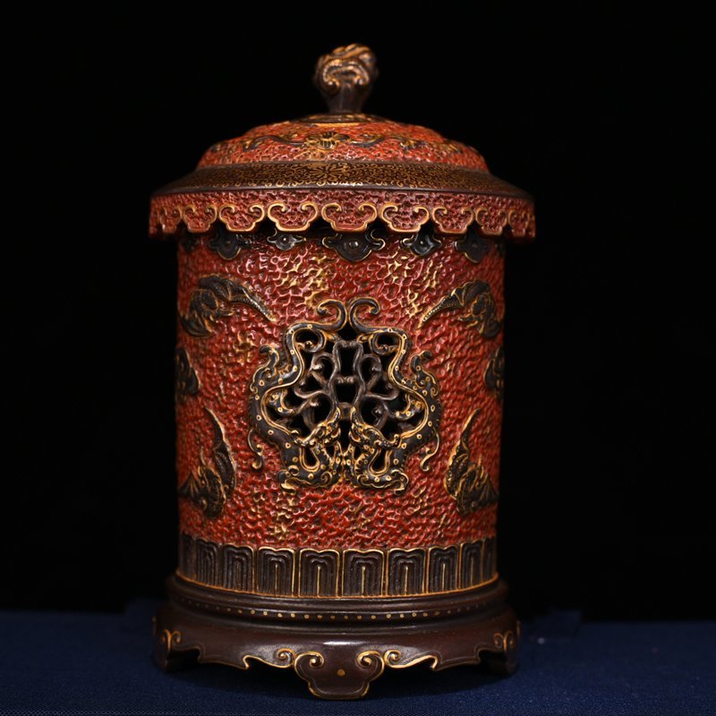 Qing Dynasty Qianlong alum red gold carved hollow smoker vase