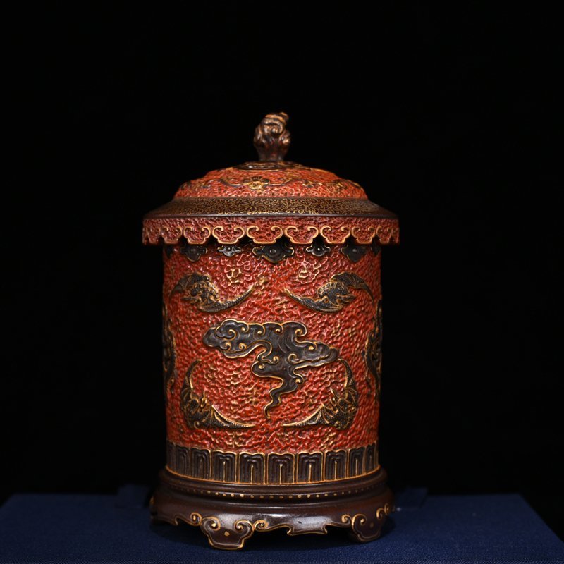 Qing Dynasty Qianlong alum red gold carved hollow smoker vase