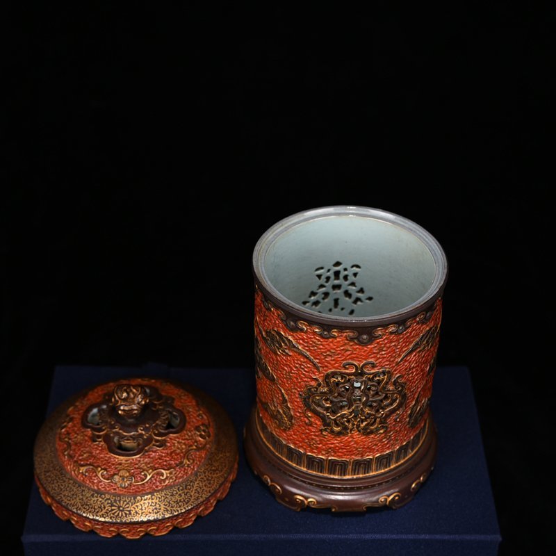 Qing Dynasty Qianlong alum red gold carved hollow smoker vase