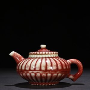 Qing Dynasty Qianlong Festival red kiln glazed chrysanthemum petal pot