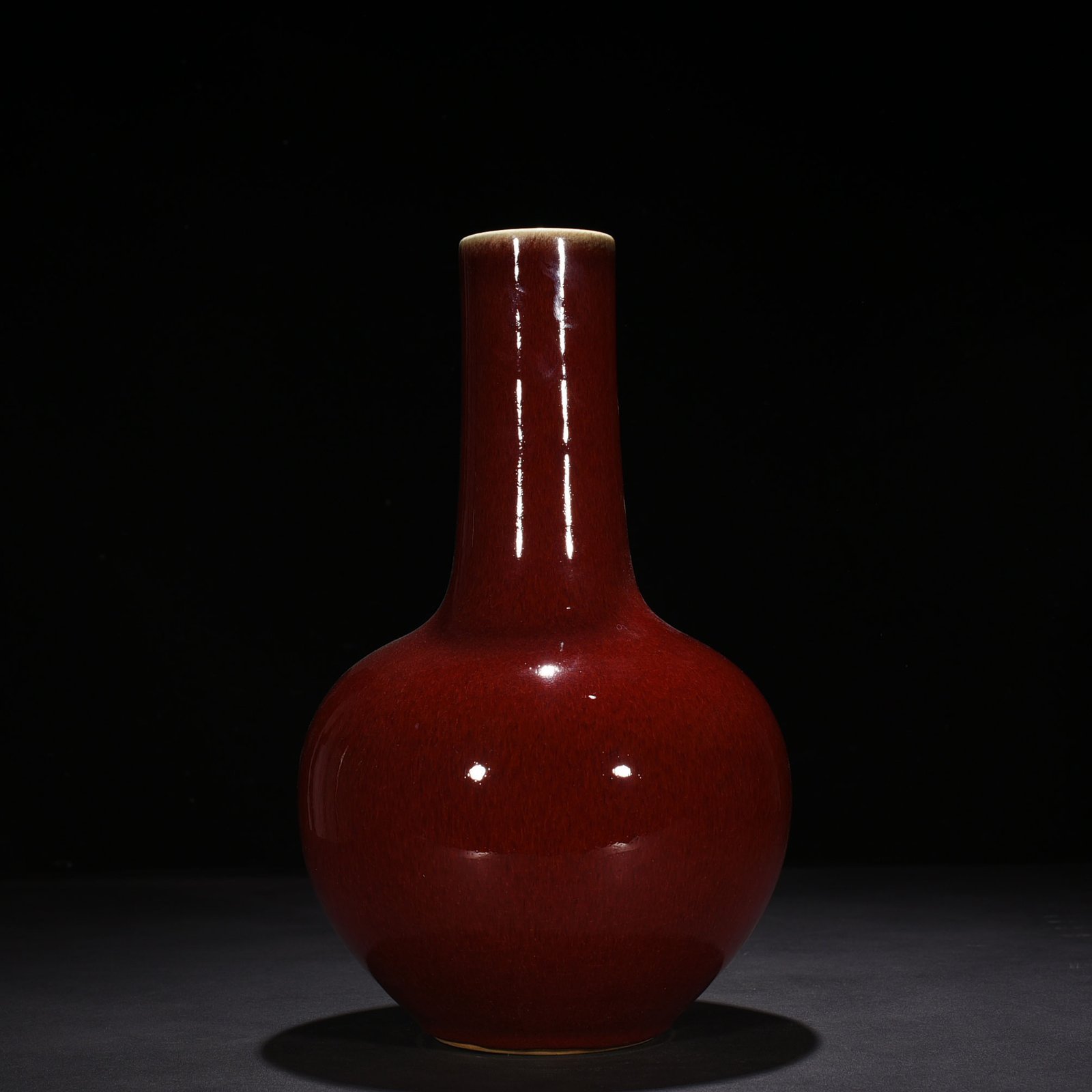 Qing Dynasty Qianlong Festival red-glazed celestial sphere vase