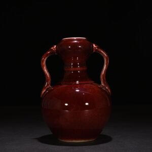 Qing Dynasty Qianlong Festival red glaze Ruyi ear garlic vase
