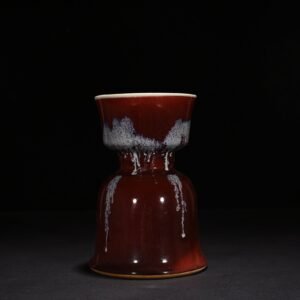 Qing Dynasty Qianlong Festival red glaze candlestick