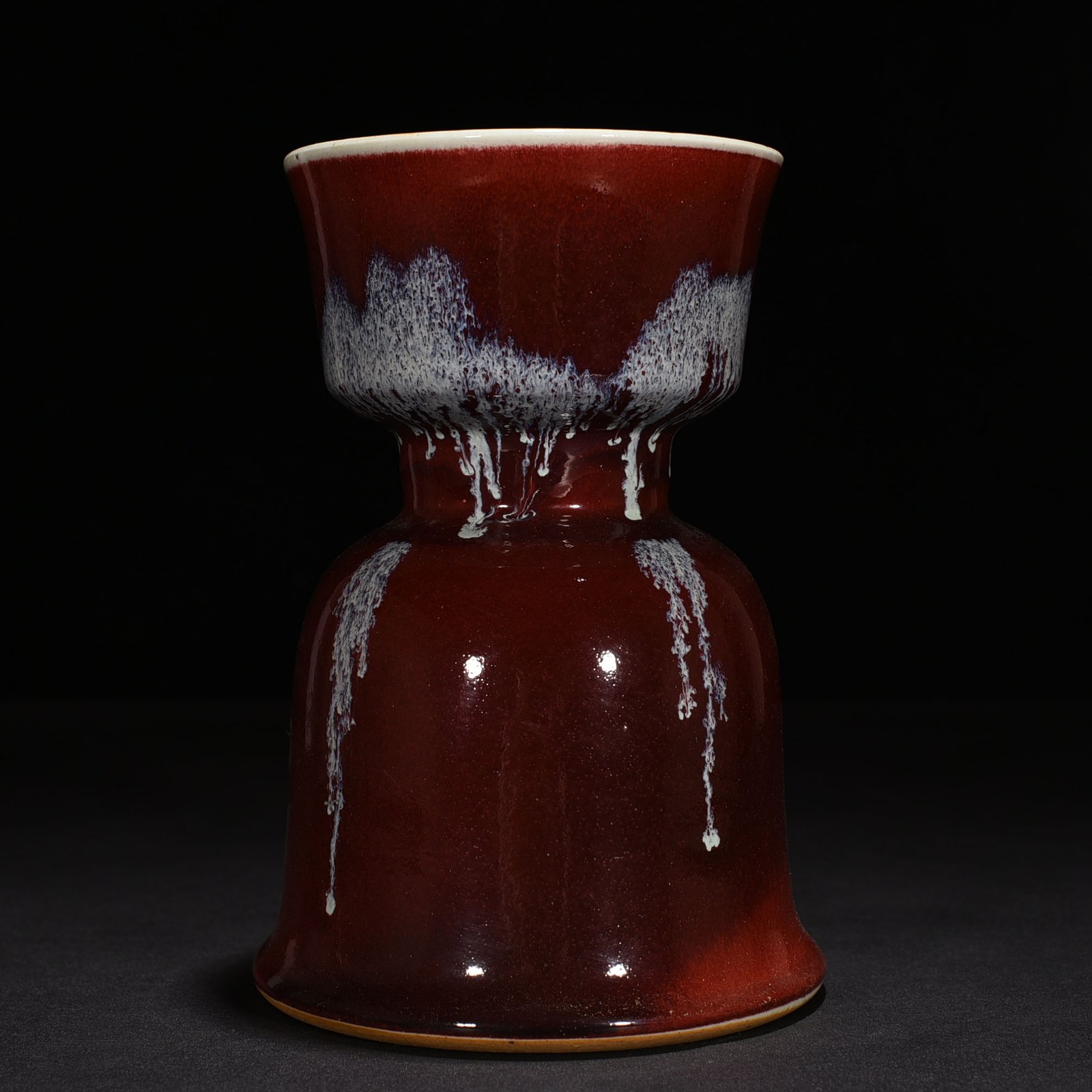 Qing Dynasty Qianlong Festival red glaze candlestick