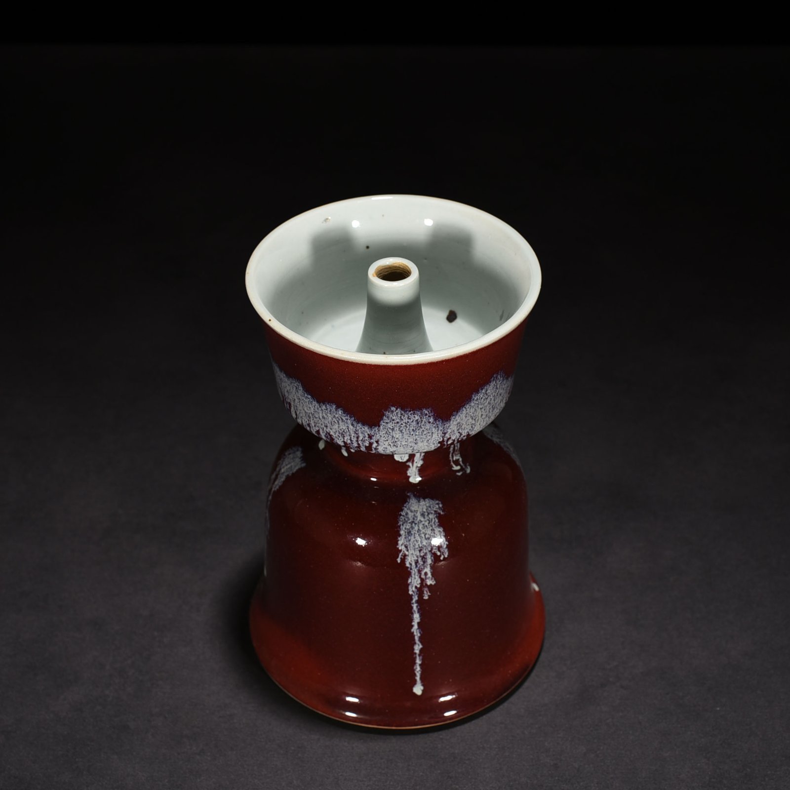Qing Dynasty Qianlong Festival red glaze candlestick
