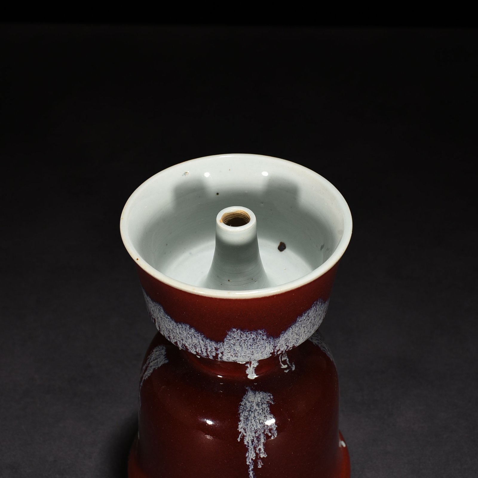 Qing Dynasty Qianlong Festival red glaze candlestick