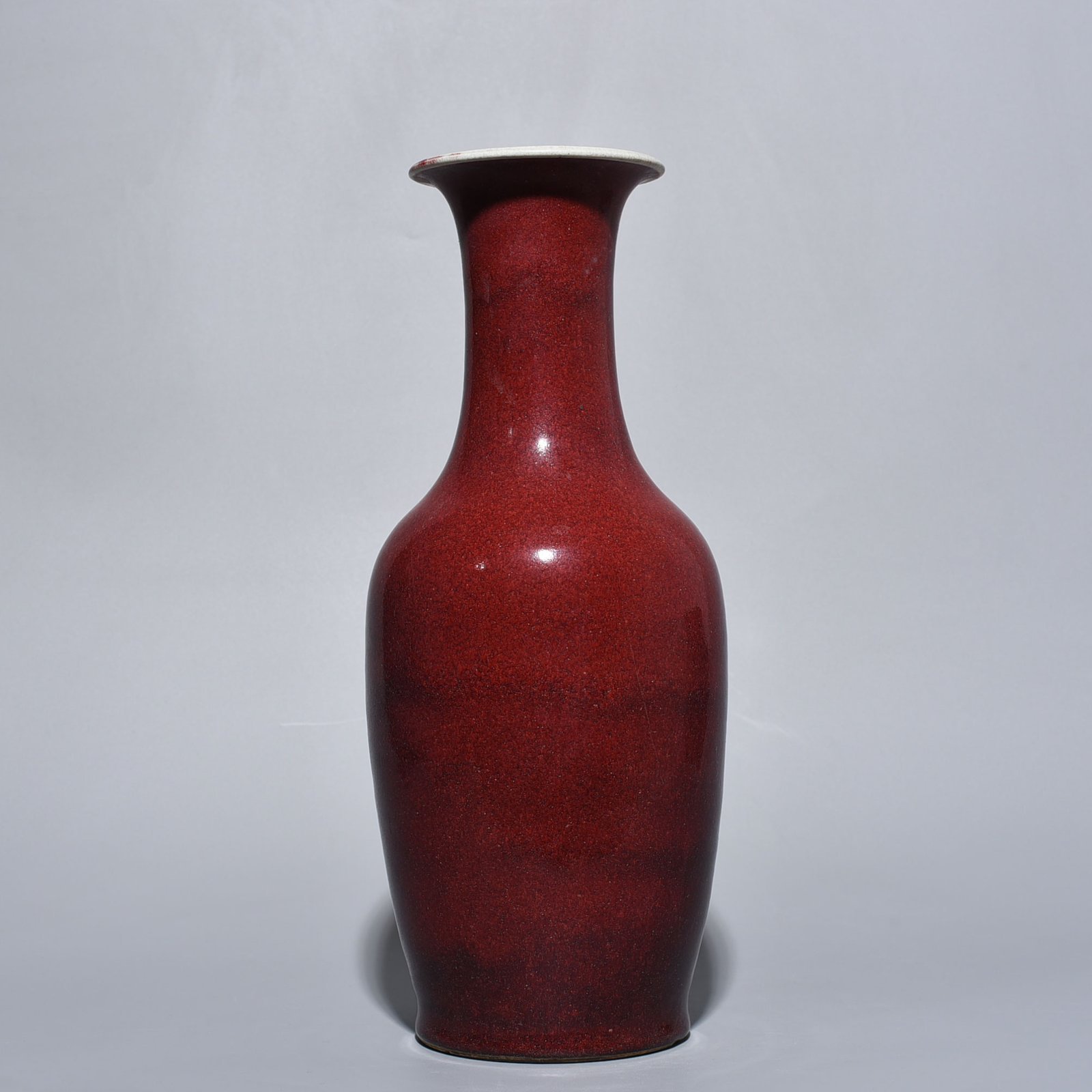 Qing Dynasty Qianlong memorial red glaze vase