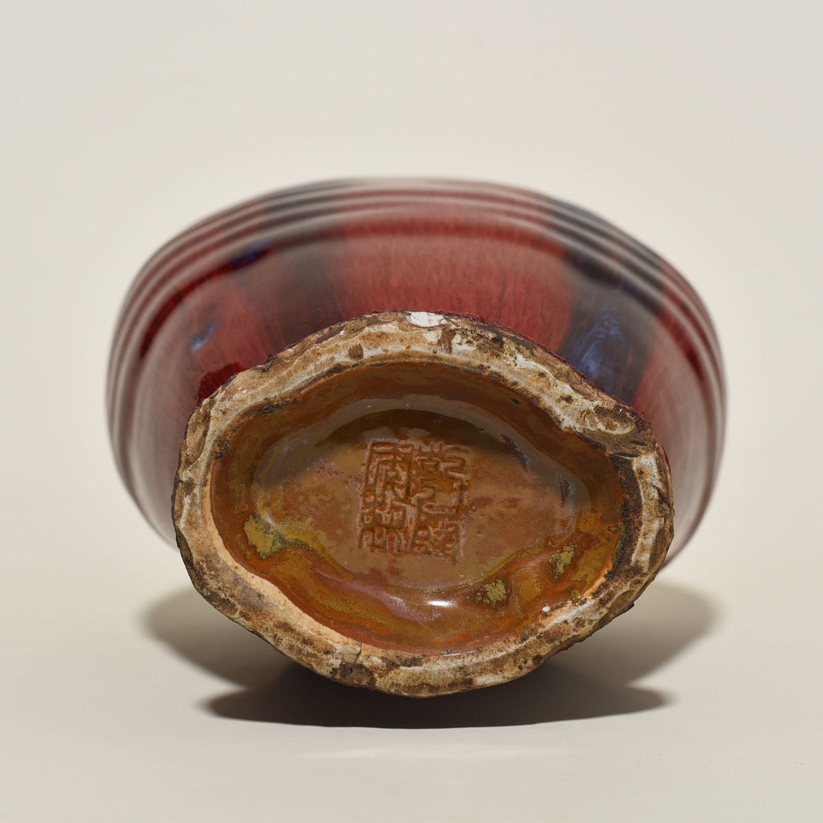Qing Dynasty Qianlong Festival red glaze kiln-turned brocade flat vase