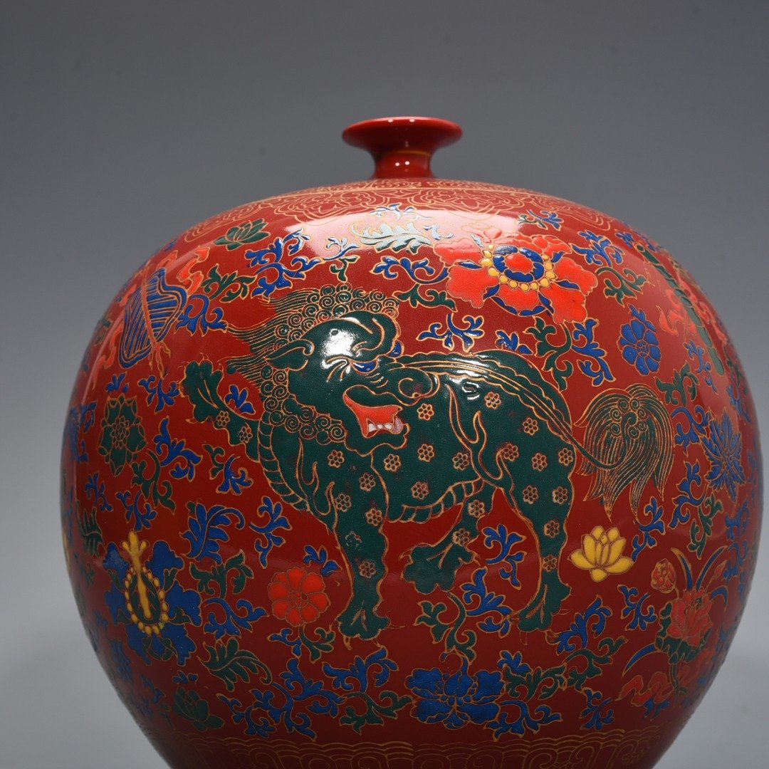 Qing Dynasty Qianlong Festival red glaze pastel unicorn pattern apple statue