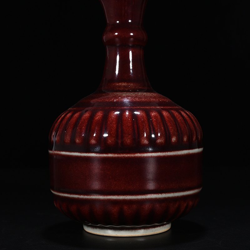 Qing Dynasty Qianlong Festival red glaze dazzling flower pouring