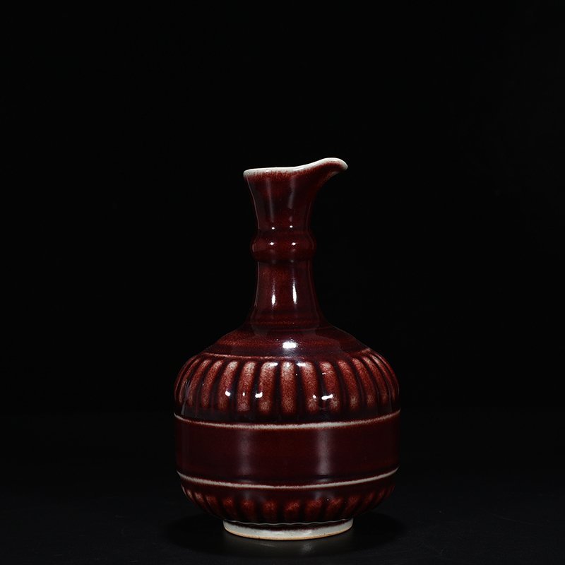 Qing Dynasty Qianlong Festival red glaze dazzling flower pouring