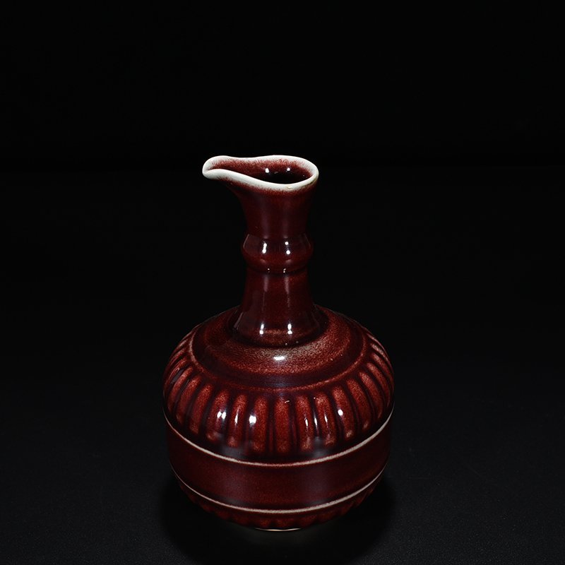 Qing Dynasty Qianlong Festival red glaze dazzling flower pouring