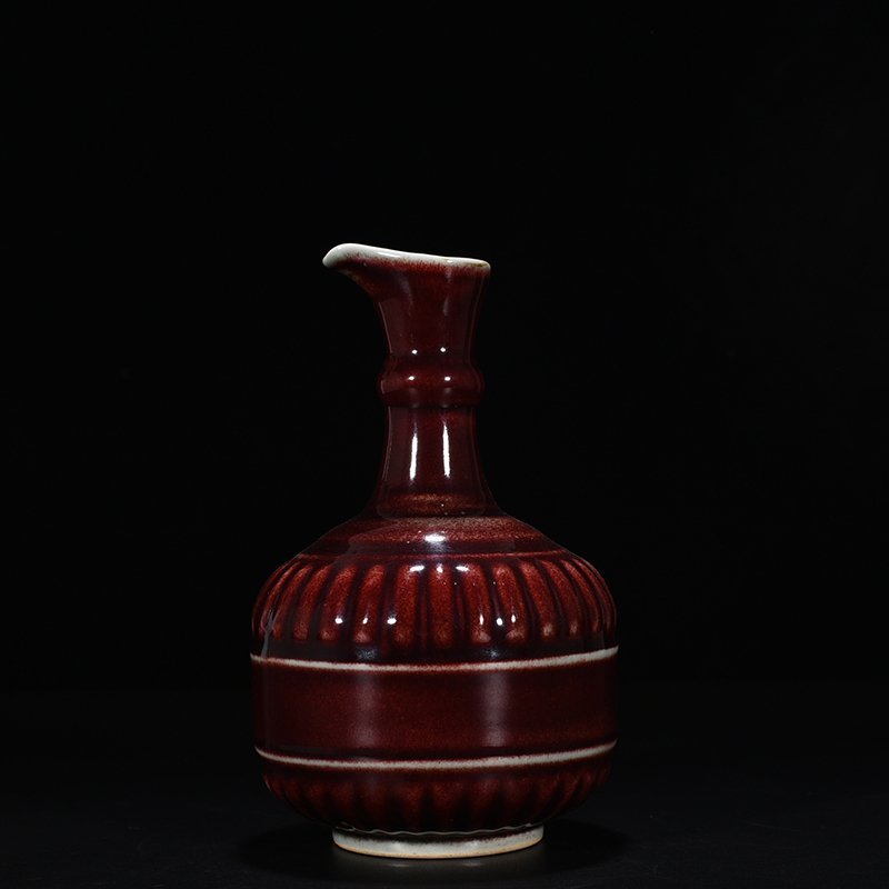 Qing Dynasty Qianlong Festival red glaze dazzling flower pouring