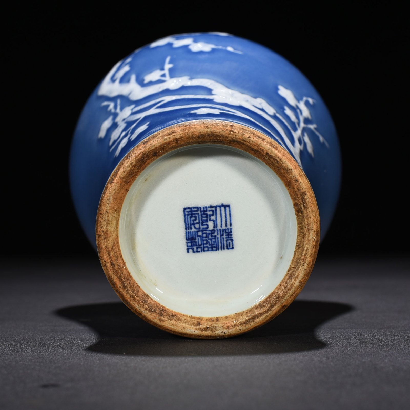 Qing Dynasty Qianlong Festival blue-glazed plum vase with plum blossom pattern