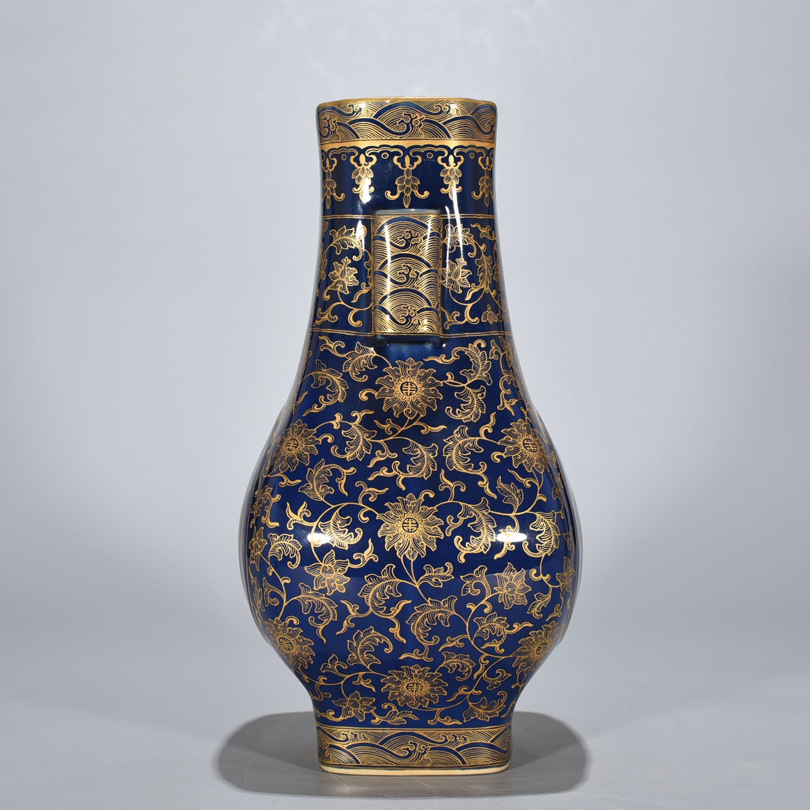Qing Dynasty Qianlong Festival blue-glazed gold-painted five-blessing holder apricot round ears square vase
