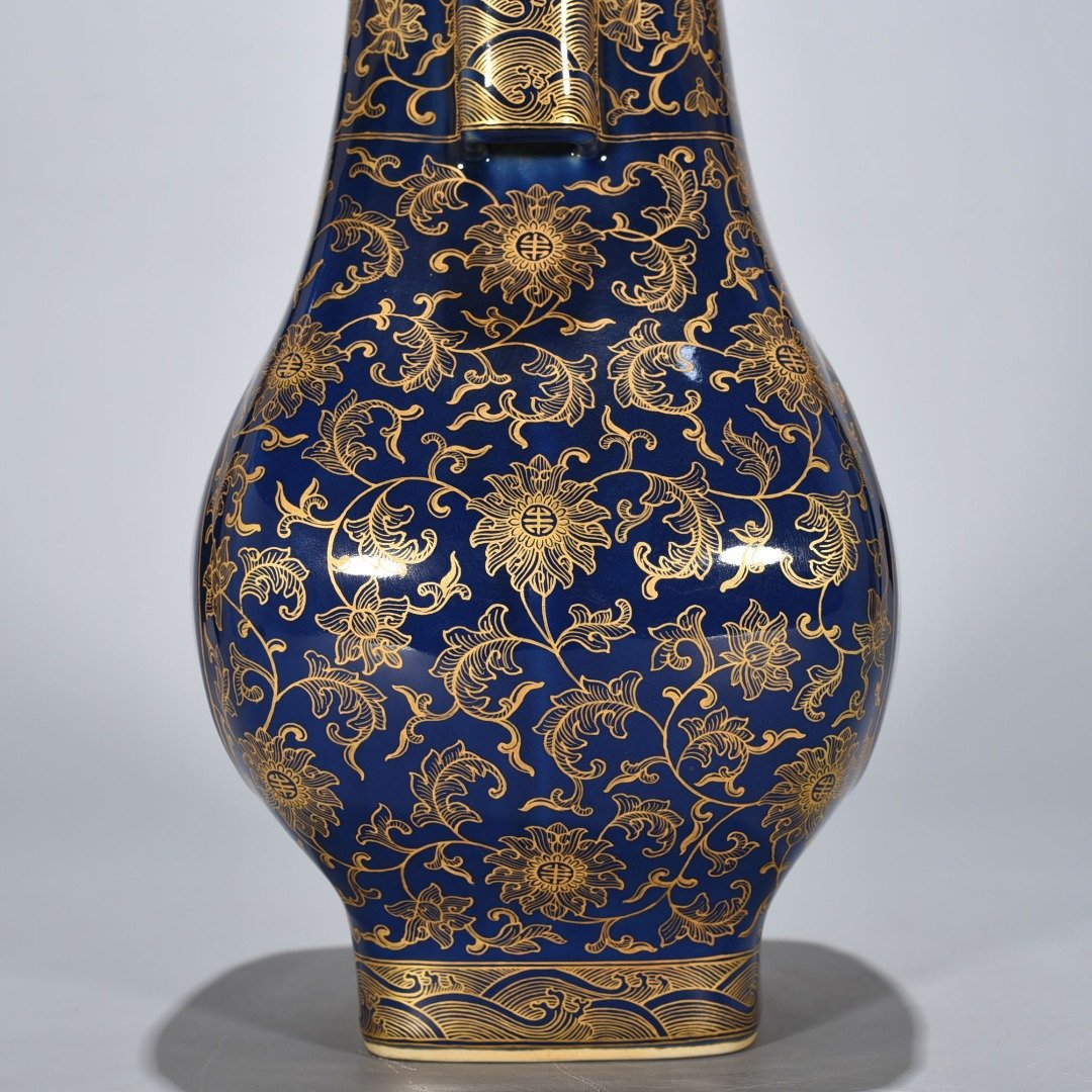 Qing Dynasty Qianlong Festival blue-glazed gold-painted five-blessing holder apricot round ears square vase